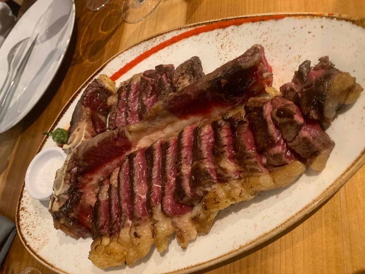 Sliced costela served on a restaurant plate